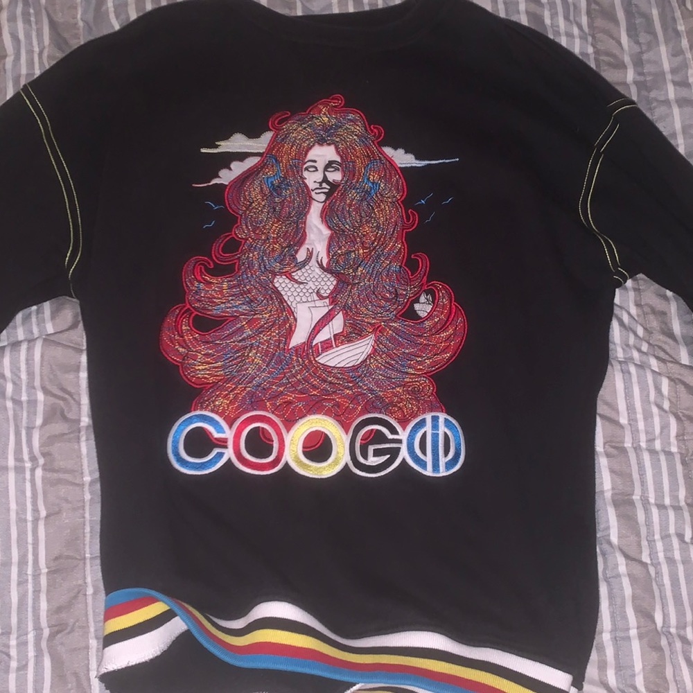 Perfect condition COOGI detailed sweater. Says XXL size but fits medium.